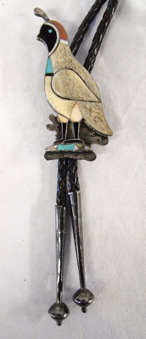 1950 Zuni Sterling Inlay Quail Bolo Tie: 1950's Zuni Sterling Inlay Quail Bolo Tie, slide measures 1.5'' x 3''L, inlay consists of turquoise, onyx, bone, mother of pearl, pipestone, and abalone, hand stamped details, sterling aglets, gorgeou