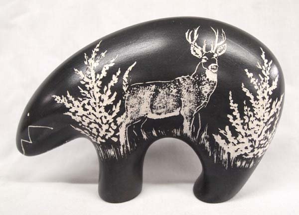 2010 Navajo Pottery Bear with Carved Deer Designs: 2010 Native American Navajo Pottery Bear with Carved Deer Designs by Frank Lee, measures 8.5''L x 5.5''H, signed by artist