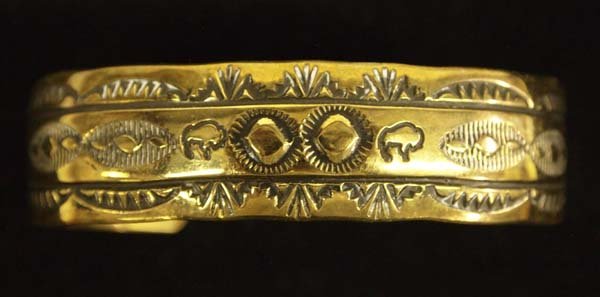 Navajo 12K Gold Filled Sterling Silver Bracelet: Native American Navajo 12K Gold Filled Sterling Silver Bracelet by Wayne Etsitty, inside measures 7'' which includes opening x .5'', stamped 12K GF and hallmarked