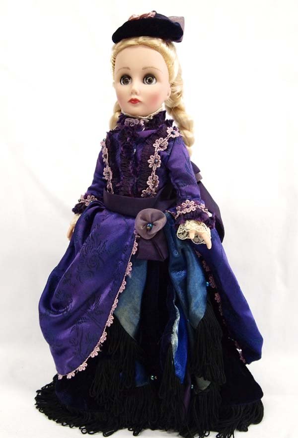 Collectible New in Box Effanbee Doll Company Doll: Collectible New in Box Effanbee Doll Company Doll. Model MV145 and named ''DIANA'' this doll in here period clothing comes with tag and stand in a clothing covered and ribboned box. Doll measures 11.5