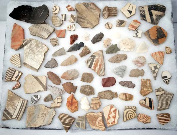 Prehistoric Mimbres Pottery Sherds and Arrowheads: Prehistoric Native American Mimbres Pottery Sherds and Arrowheads, longest measures 3''L, includes stone arrowheads and Mimbres pottery sherds, found on Mangas Ranch in New Mexico, Acquired in accorda