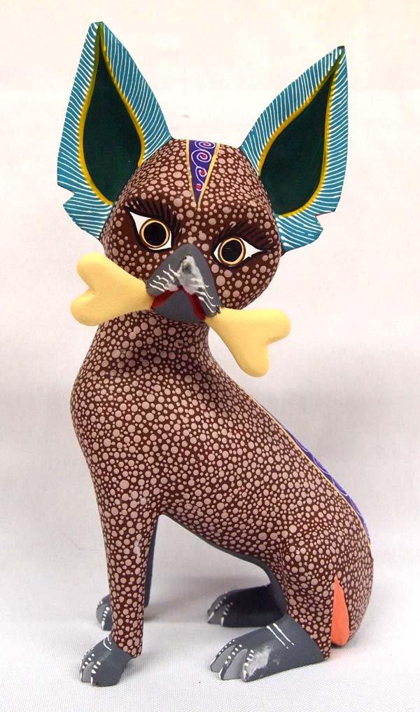 Mexican Oaxacan Chihuahua Alebrije, Isaac Fabian: Mexican Oaxacan Chihuahua Alebrije by Isaac Fabian, measures 2'' x 9''H x 4.5''W, hand carved and painted in vibrant colors, signed by artist