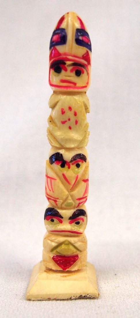 1940's Carved Bone Souvenir Totem Pole: 1940's Carved Bone Souvenir Totem Pole, measures 1'' x 3.5''H x 1'', hand painted