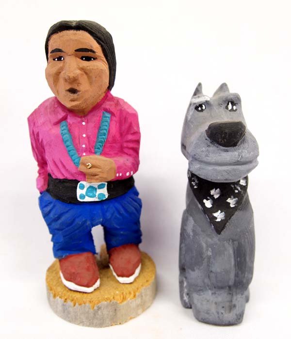 Navajo Carved Wood Folk Art Figures by Juan: Pair of Navajo Carved Wood Folk Art Figures by Juan, #1 1997 Navajo Man by Harrison Juan #2 1998 Dog by J.R. Juan, largest measures 6''H x 2.5''W, both figures are signed and dated