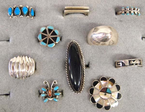 10 Sterling Silver Rings, Some Native American: 10 Sterling Silver Rings, Some Native American, includes Hopi, Zuni, and Navajo, sizes range from 5.5 to 7.5, longest measures 1.75''L, stones included are onyx, turquoise, jet, abalone, and coral, th