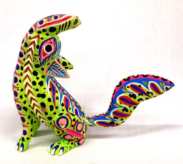 Mexican Oaxacan Coyote Alebrije by C. Carrillo: Mexican Oaxacan Coyote Alebrije by Crecencio Carrillo, measures 6'' x 8'', signed by artist and vibrantly painted