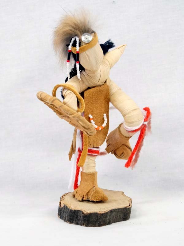 Iroquois Corn Husk Dancer Doll: Iroquois Corn Husk Dancer Doll This piece with its leather and yarn trimmings measures 7''H.