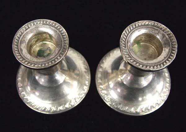 Pair of Sterling Silver Candle Holders: Pair of Sterling Silver Candle Holders Hallmarked and Stamped Duncan Creations, Sterling, Weighted. They measure 3''H x 3''W
