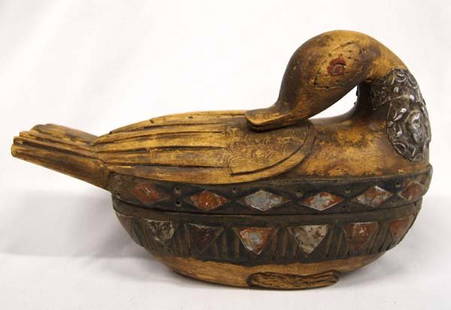 Vintage African Wood Duck Trinket Box: Vintage African Hand Carved Wood Duck Trinket Box. Made in Ghana with metal embellishments, this piece measures 6''H x 4''W x 9.25''L.