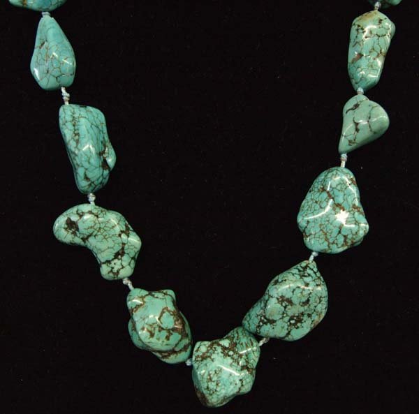 Southwestern Pilot Mountain Turquoise Necklace: Stunning Southwestern Pilot Mountain Turquoise Necklace, largest nugget measures 1.5''L x .75''W, strung on knotted silk, measures 24'' end to end