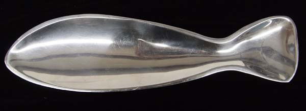Nambe Fish Plate: Nambe Fish Plate, measures 17'' x 4.5'', paper label on bottom of piece, FYI: ''Nambe' manufactures serveware, barware, home decor and gift items. The company was founded in the village of Nambe', a s