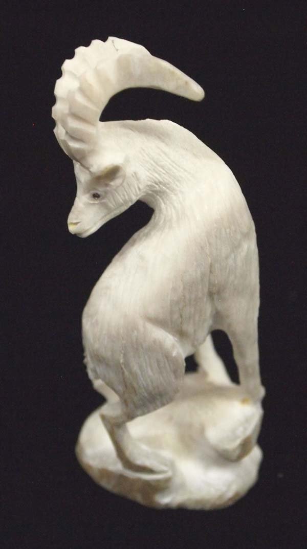 Zuni Hand Carved Antler Ibex Sheep Fetish: Native American Zuni Hand Carved Antler Ibex Sheep Fetish by Pernell Laate, measures 2.25''H, signed by artist, fabulous detail