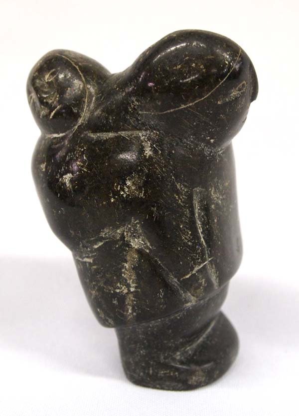 Canadian Inuit Carved Stone Mother + Child, Paneak: Native American Canadian Inuit Carved Stone Mother and Child by Paneak, measures 4.25'' x 2.25'' x 2.25'', signed in Inuktitut