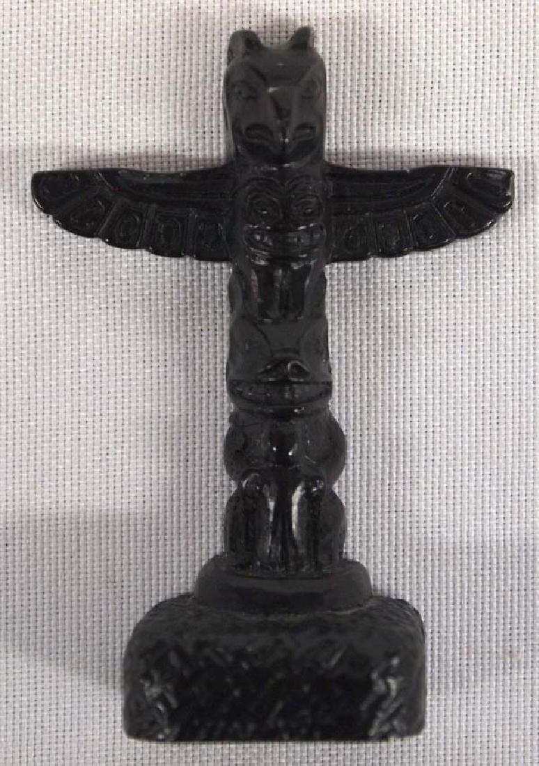 Northwest Coast Miniature Carved Wood Totem Pole: Native American Northwest Coast Miniature Carved Wood Totem Pole, measures 2.5'' x 2'' x .75'', signed in Inuktitut but can't resolve the signature