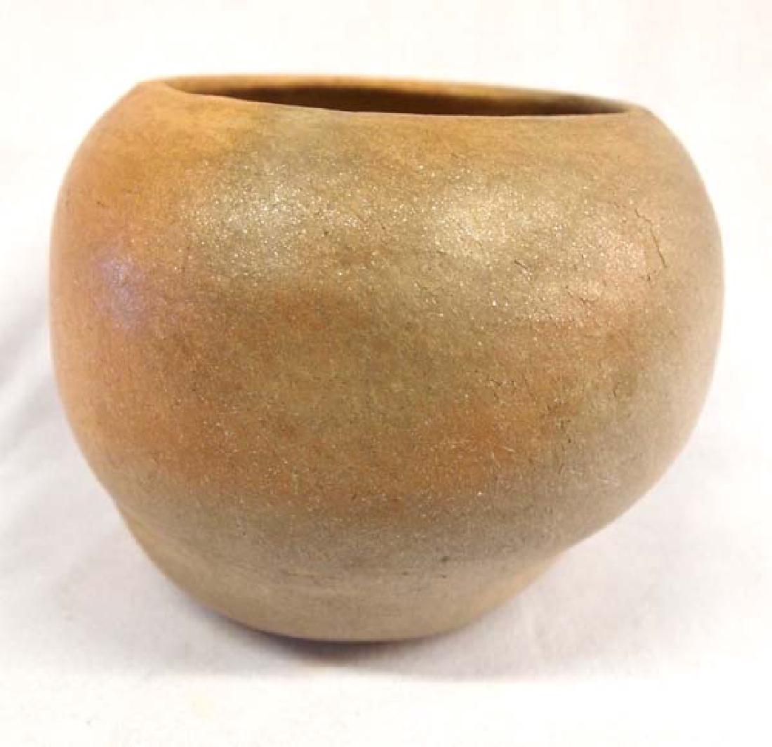 Native American Picuris Micaceous Clay Pottery Jar: Native American Picuris Micaceous Clay Pottery Jar, measures 5'' x 6.5'', fire clouds present