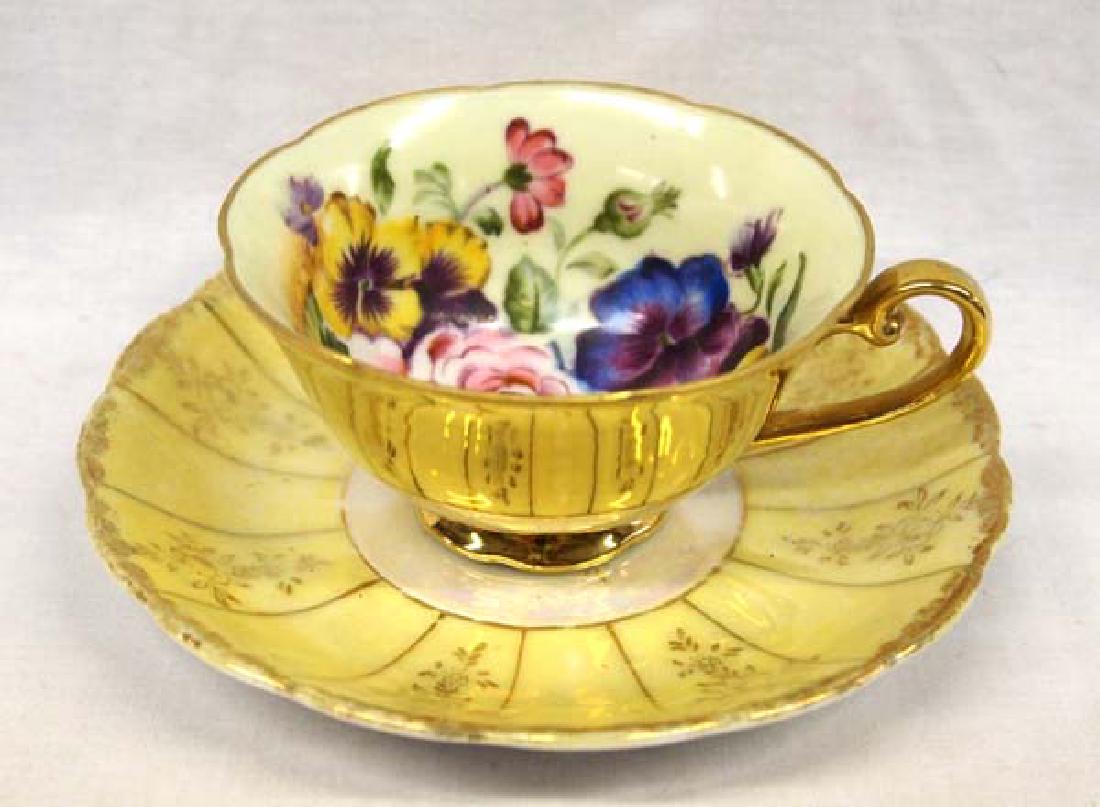Japanese Gold Gilt Cup & Saucer: Japanese Gold Gilt Cup & Saucer, cup measures 3.75''D and saucer measures 5.75''D, saucer is marked Made in Japan and cup is marked hand painted S3518