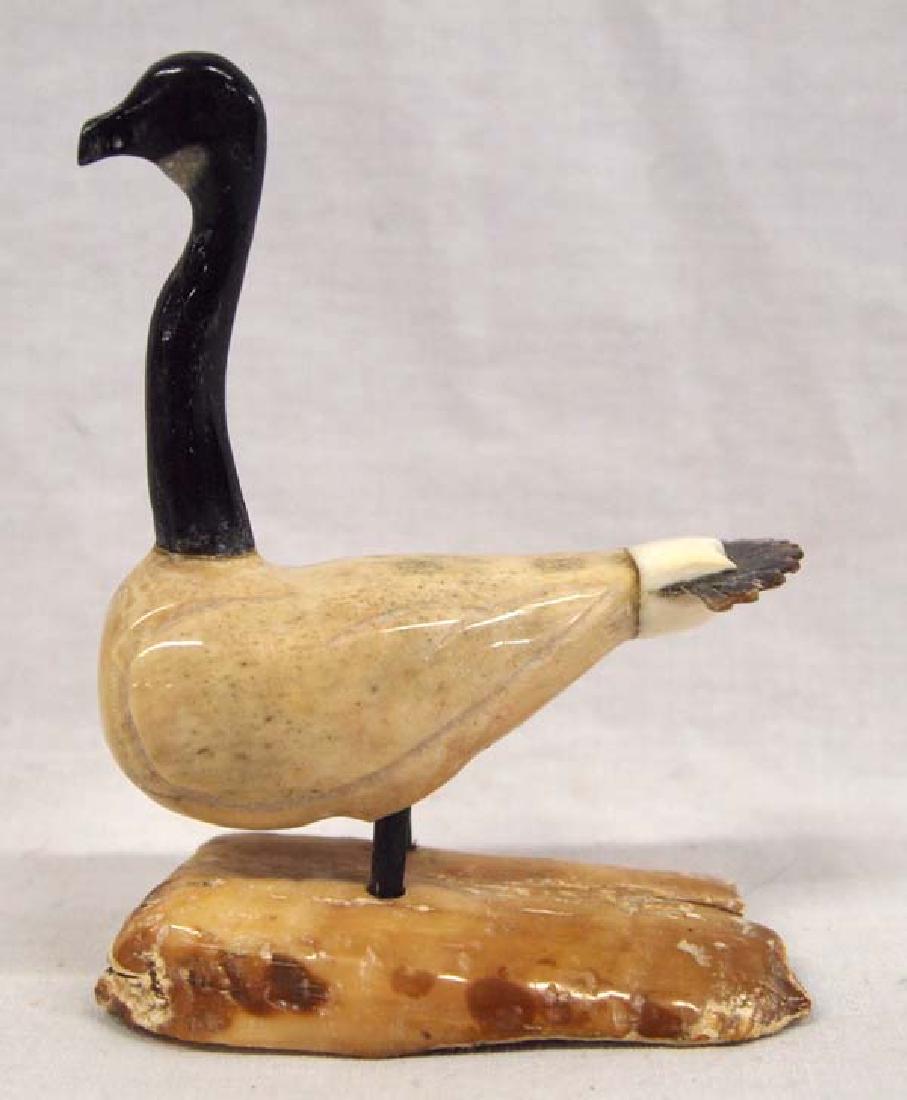 Alaskan Bone Carving of a Goose by Swlooko: Alaskan Bone Carving of a Goose Carving by Harold B. Swlooko, signed H.B.S., made of bone, and baleen, beautiful piece, measures 4"H x 3"L