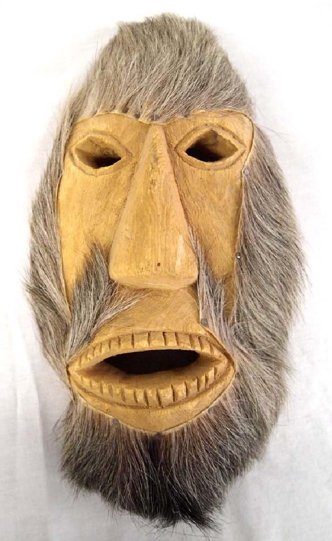 Canadian Inuit Carved Wood and Fur Mask: Fabulous Native American Canadian Inuit Carved Wood and Fur Mask, measures 12'' x 6'' x 4''Deep