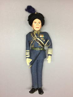 Farnell Alpha King George VI Doll in RAF Uniform: His Majesty the King, George VI is 14” tall and made of felt and fabric by Farnell’s Alpha Toys in England in the 1930s or ‘40s. His face is beautifully hand painted, and he wears a detailed