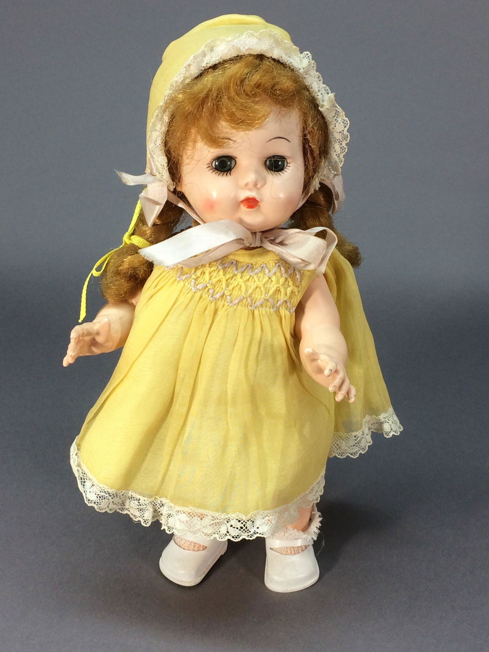 Block Answer Doll 1950s Hard Plastic 10” Yes No: This hard plastic doll by the Block Doll Corporation dates to the 1950s. She is 10 inches tall and is jointed at the neck, shoulders and hips. When you press the button on her belly, she shakes her he