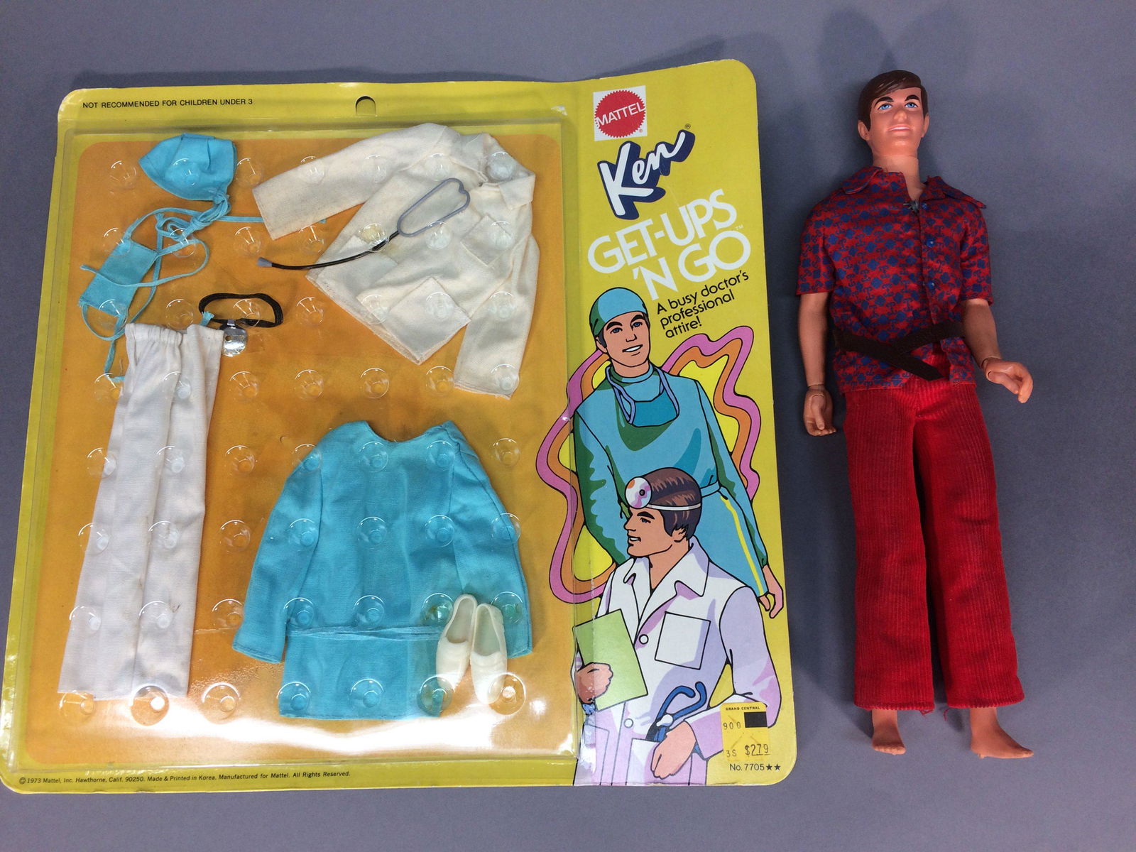 Talking Busy Ken Doll w/ NRFB Get-Ups 'N Go #7705: Talking Busy Ken is 12" tall and was made in 1972. He comes to you in his original shirt with attached belt, missing the belt buckle, and corduroy pants. Get Ups 'N Go #7705, dated 1973, is "A Busy Do