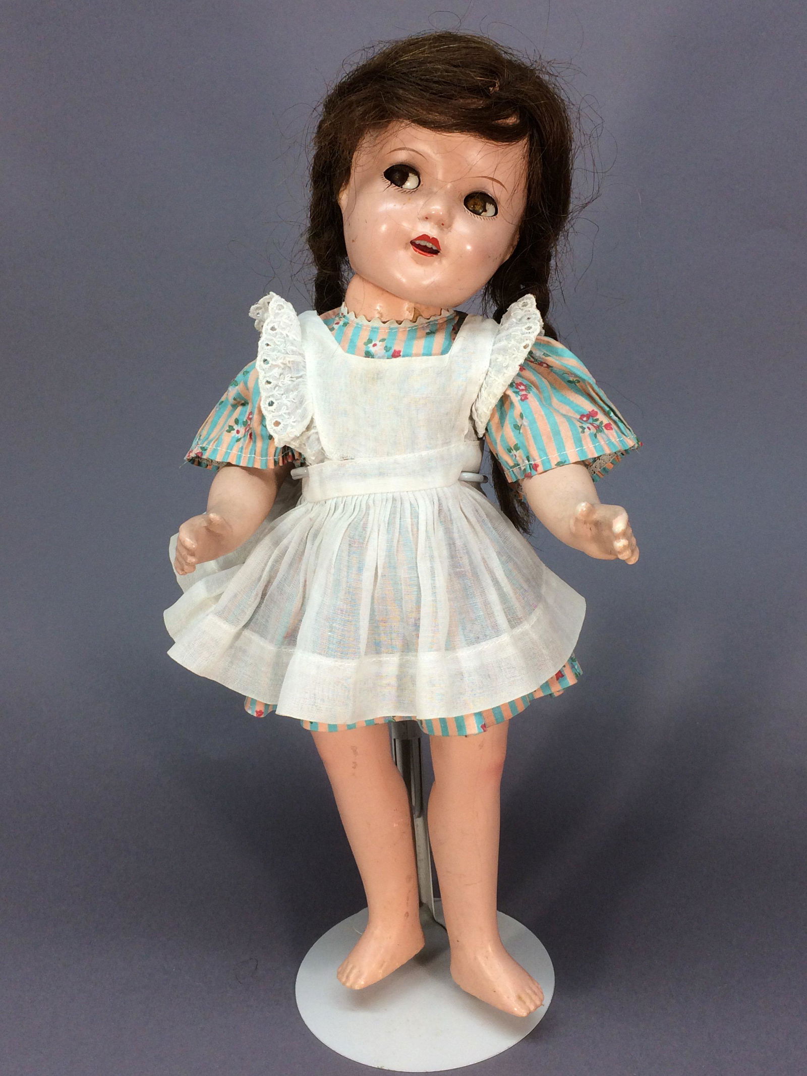 Ideal Compo Ginger or Pigtail Sally Doll Flirty: This composition doll is 15” tall with flirty sleep eyes and a brunette human hair wig in braids. She was made by Ideal and is either Ginger or Pigtail Sally, from the late 1930s or early 1940s. She