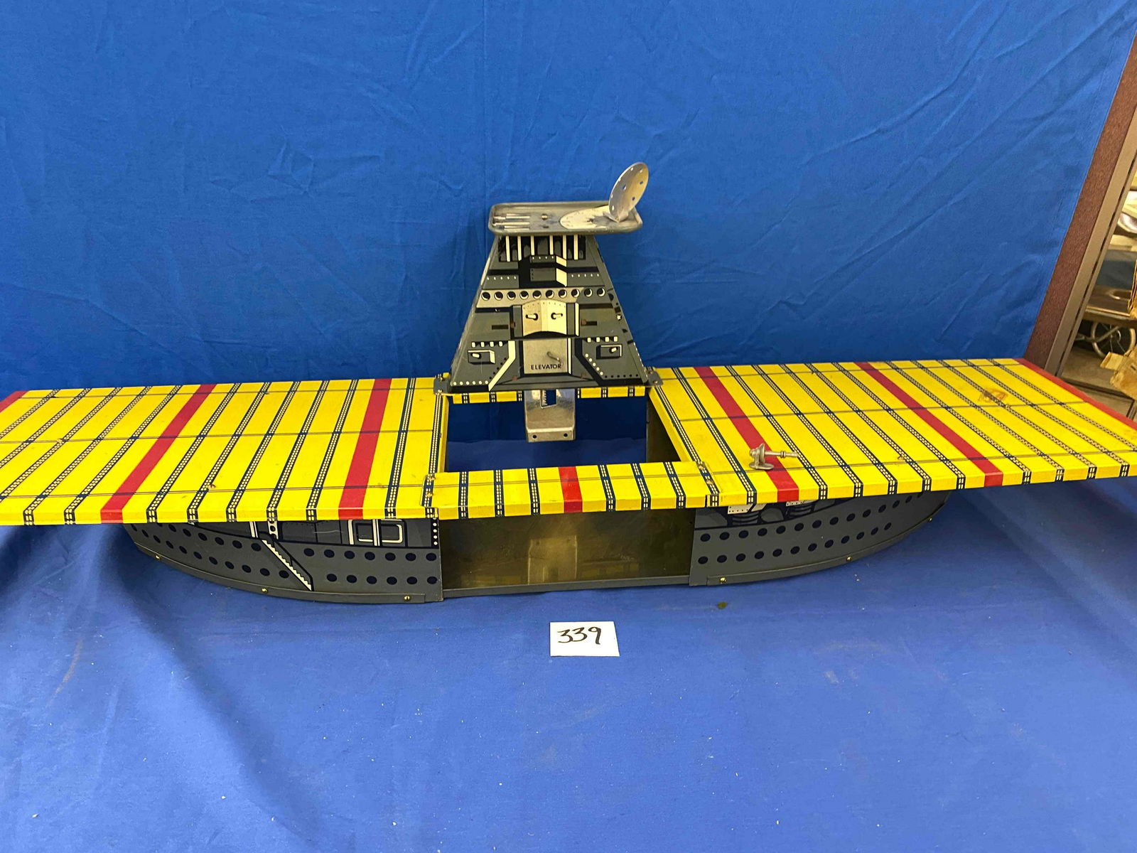 Tin Aircraft Carrier: No visible manufactures' mark, Very Good Condition, but missing elevator deck and one set of wheels on bottom