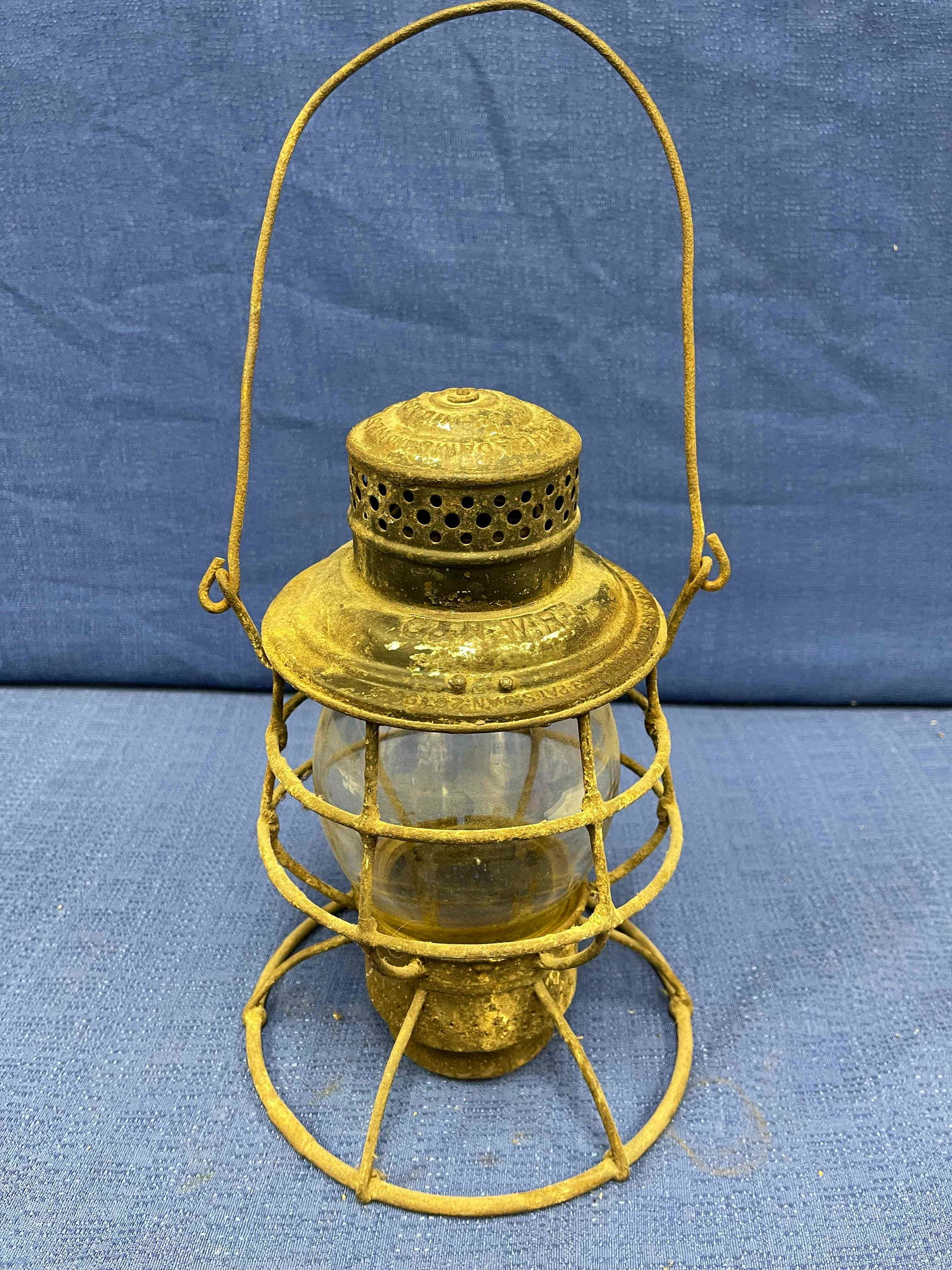 Chicago & Northwestern Railroad Adams & Westlake: â€œC&NW Ry” cast into top rim of lantern, with a last patent date of 1909. Clear cast Corning globe with patent date of 1902 on top rim and â€œC&NW Ry” cast into globe. Missing fou