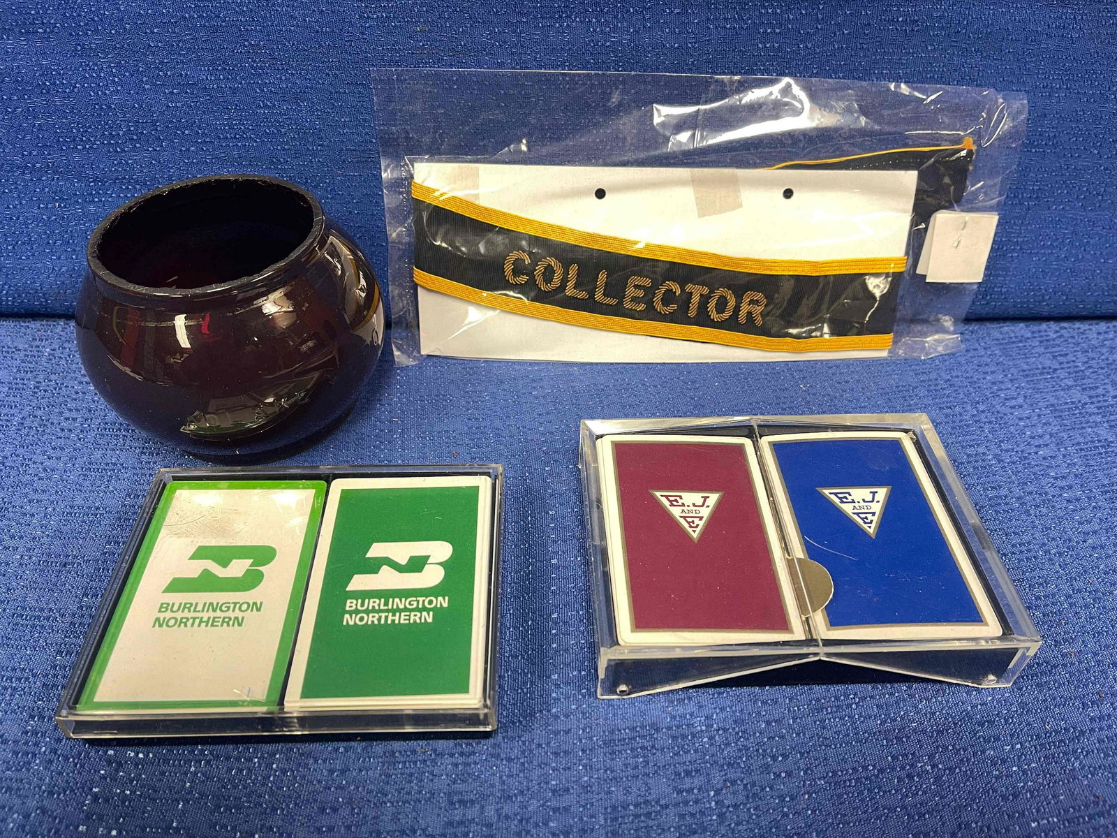 Railroad Collectibles Lot: Collector Hat Ban. Two decks of Elgin, Joliet, and Eastern Railway cards. Red Safety First Switchman's Lantern Lenses. Two decks of Burlington Northern cards - still in the wrap.
