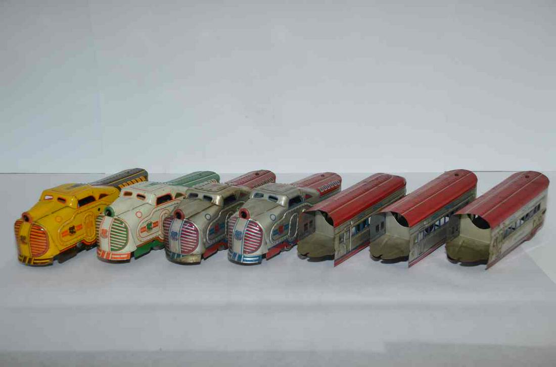 Marx O Scale Union Pacific RR M10005 Set with 3 Extra Locomotives: Marx O scale Union Pacific RR M10005 set. Includes locomotive and three carsâ€”Denver, Los Angeles, and Squaw Bonnet. Includes extra identical locomotives in red, silver, and blue livery, as well