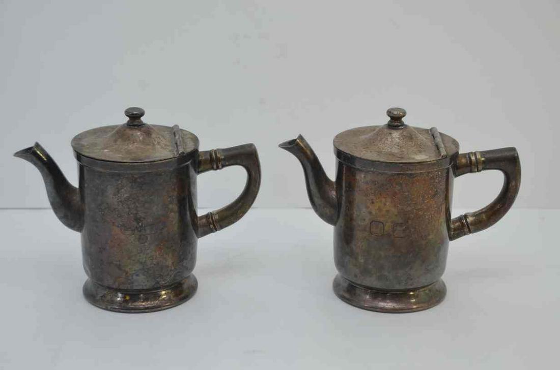 Two Nickel-Silver Railroad Coffee Pots-OC RR: This is a pair of nickel-silver railroad coffee pots marked OC on the side. There are many railroads that have the â€œOC” initials, but we can not be sure of to which these belong. Made by t