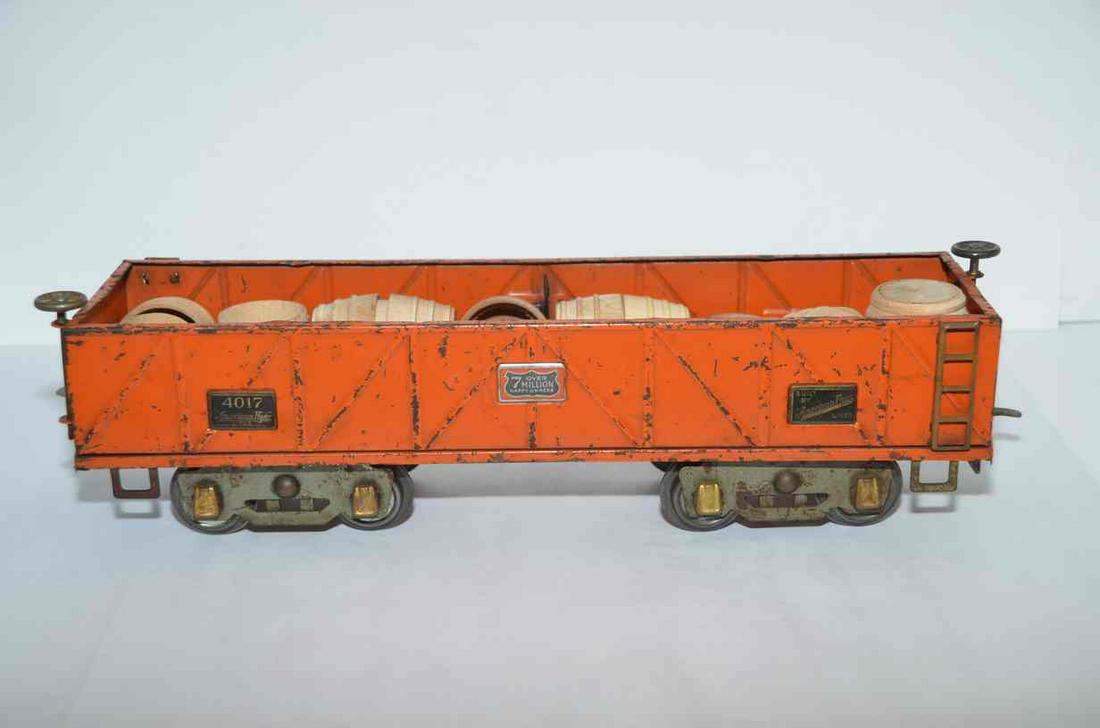 American Flyer 1930s Pre-War Wide Gauge Orange Sand Car #4017: This is rare, high demand American Flyer 1930s wide gauge pre-war orange sand car/gondola #4017. These orange cars are very rare and hard to find in most any condition. Comes with wooden barrels as a 