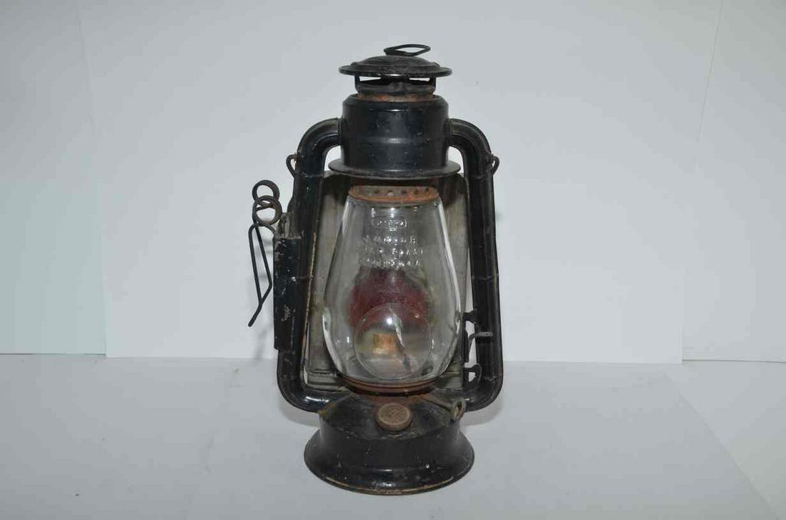 Dietz Junior Lantern: This is a Dietz Junior lantern with a clear “Cold Blast” globe. Small red reflector lens on the back and clear eye lens inside the globe, but it is cracked. Correct burner and fount; burne