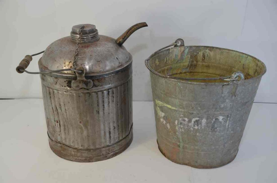 Great Northern RY Oil Can and Ash Bucket: This lot includes a very nice Great Northern Railway oil/kerosene can, and a well used ash bucket. The can is complete, including its lid, chain, and wooden handle. There is one dent in the side of th
