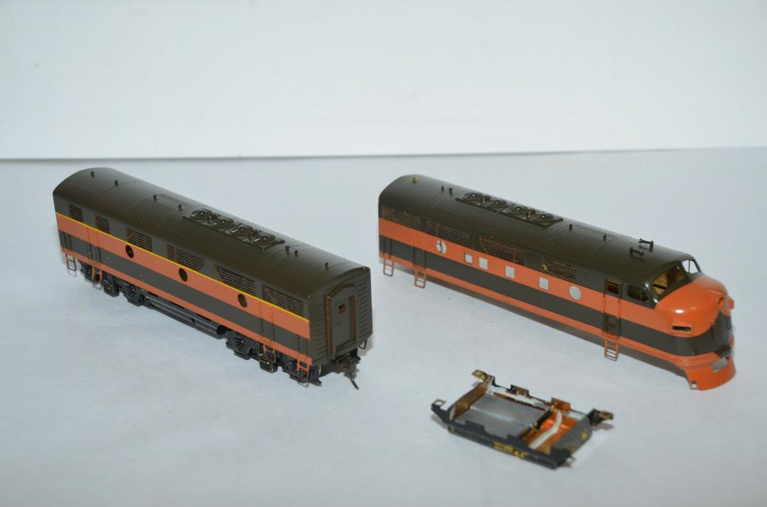 Nickel Plate Products Brass-EMD Phase II F3 Diesel AB Set-HO Scale: This is a Nickel Plate Products Brass EMD Phase II F3 diesel locomotive AB set that is incomplete. It looks as if the previous owner had painted them in a Northern Pacific scheme. However, while the B