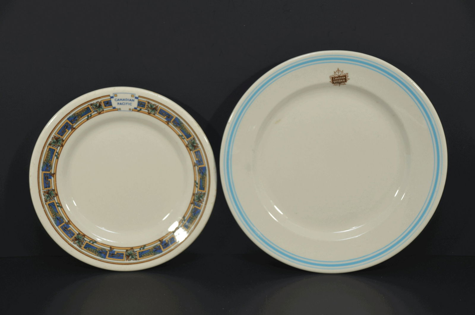Two Different Dinner Plates-Canadian Pacific/Canadian National: This is a pair of two different plates from the Canadian Pacific and Canadian National Railroads. The first is a rare 7.5 inch diameter salad plate from the CP. Made by Ridgways of Shelton, England, i