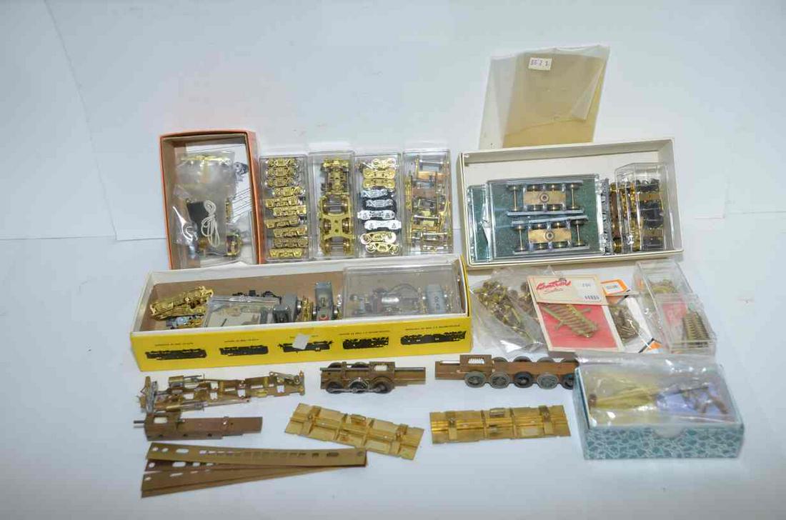 Large Brass Parts Lot-HO and N Scale: This large brass parts lot features mostly HO scale items, but a few N scale as well, Trucks, wheels, chassis, frames, detail parts, car sides, and much more. All sell for one price in this lot.