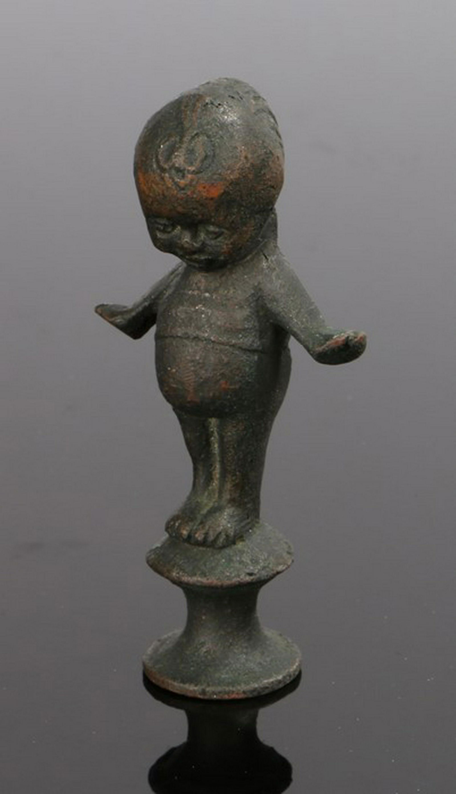 Rose O'Neill Kewpie design, circa 1925 pipe tamper of (1 of 1)
