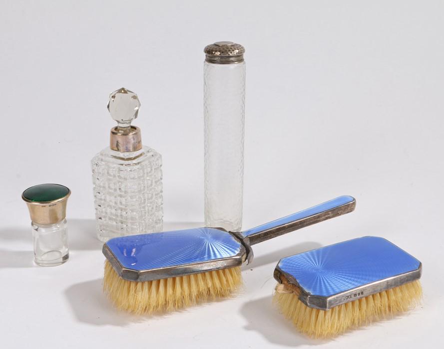 Silver mounted and glass dressing table accessories,: Silver mounted and glass dressing table accessories, various dates and makers, to include scent bottle, hat pin pot, two brushes, scent bottle (5)