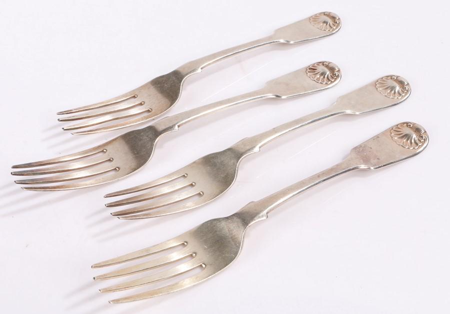Four Victorian silver table forks, Newcastle 1839,: Four Victorian silver table forks, Newcastle 1839, maker John Walton or John Wright, with shell pattern handles, the reverse of the handles engraved with a C enclosed in a shield, 8.2oz