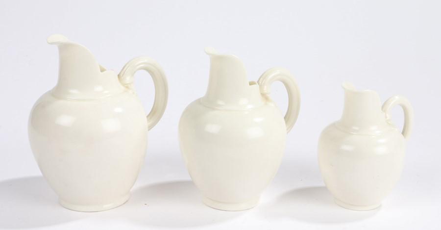 Graduated set of three Royal Worcester white porcelain: Graduated set of three Royal Worcester white porcelain jugs, registration number 29115, the tallest 14cm high (3)