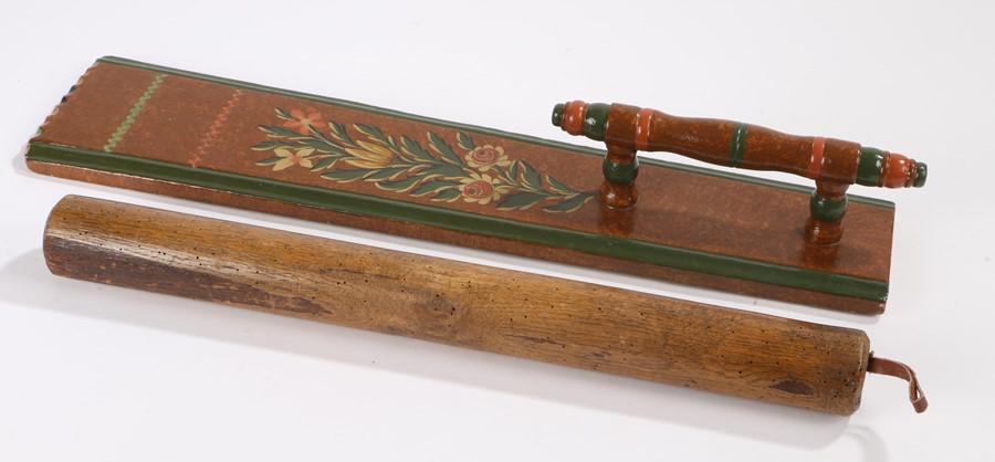 Scandinavian mangle board, polychrome painted with: Scandinavian mangle board, polychrome painted with flowers and leaf design, together with the roller, the board 60cm long, (2)