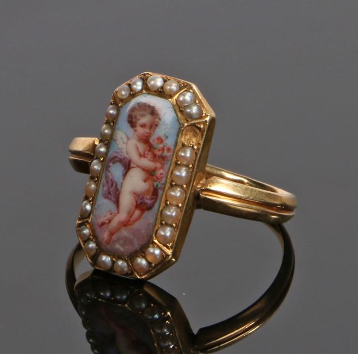 French 18 carat gold and enamel ring, the enamel panel: French 18 carat gold and enamel ring, the enamel panel with cupid between pearls, ring size M