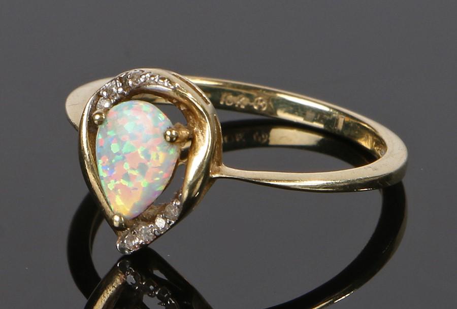 10 carat gold and opal set ring, the pear cut opal with (1 of 1)