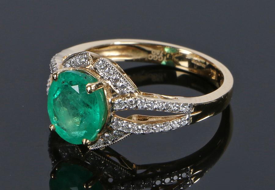 18 carat gold emerald and diamond set ring, with a (1 of 1)