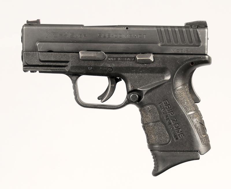 Springfield Arms XD Model 2 Pistol: Sub-Compact, .45 ACP, 3.25 in. barrel, S/N GM412167, 2 magazines,holster, load assist, magazine holder, original case