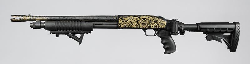Mossberg 500 Cruiser Shotgun: 12 ga., 2-3/4 and 3 in., 18-1/2 in. barrel (including flash hider), adjustable stock added with cartridge holder, rail added to sliding fore end
