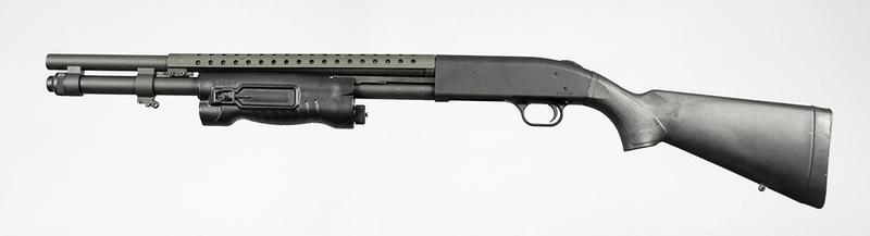 Mossberg Model 590 Pump Action Shotgun: 12 ga., 2 3/4 and 3 in. chamber, 6+1 tube fed, 20 in. barrel, S/N U086187, heat shield, L3 Insight light on front slide stock, synthetic stockÿ