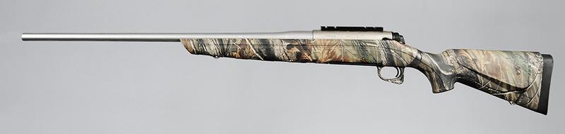 Remington Model 770 Bolt Action Rifle: 7mm Rem Mag, 24 in. barrel, S/N 71467515, mossy oak skin, stainless barrel, detachable box magazine