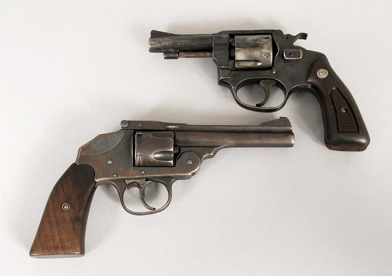 Two Revolvers: Interarms Rossi, .32 S&W long, 6-shot, 3 in. barrel, S/N C218207, good working condition, wood grips not original/don't fit correctly, 60% finish; Iver Johnson top break hammerless revolver, .32 cal.,